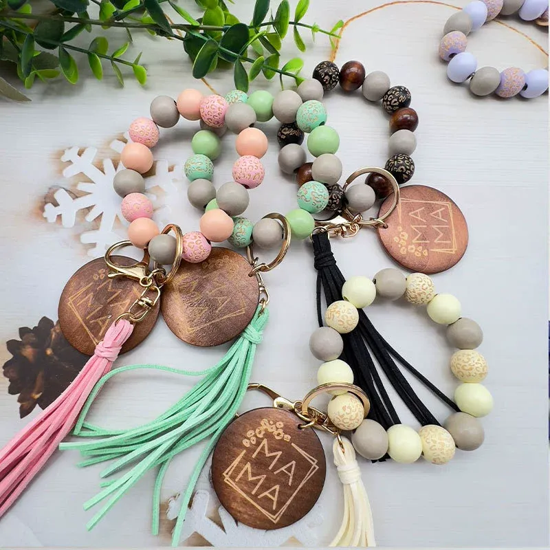 MAMA Charm Keychain with Wooden Beads and Suede Tassel